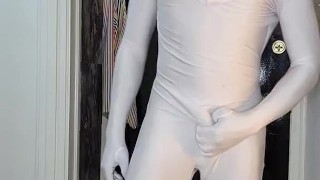 KennieJai wears whte spandex and cums