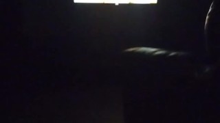Sexy guy jacking off in front of a bunch of men in open adult theater while watching tranny porn 2
