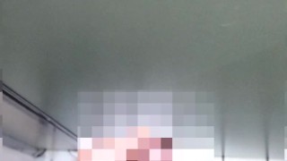 A hairy Japanese man masturbates in the bathroom. His semen splashed on the door.