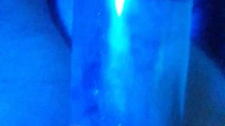 pumping dick and balls under blue light