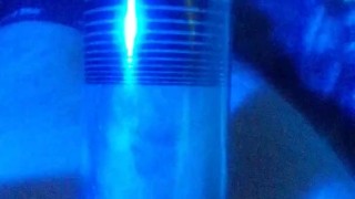 pumping dick and balls under blue light
