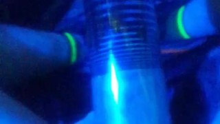 pumping dick and balls into penis pump under blue light