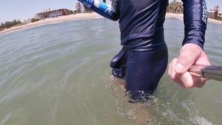 Surfer gets erect in his lycra for the pleasure of the people