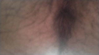 A hairy Japanese man squats and masturbates. The contraction of his anus at moment of ejaculation