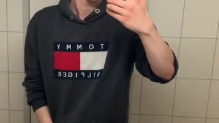 Twink jerks off in Public toilet