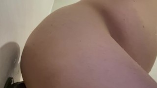 Chubby Japanese man inserts wall-mounted dildo into anus