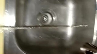 Sean takes a piss in the sink
