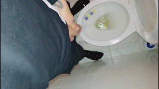 Twink with uncut cock piss in pee filled toilet at home