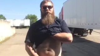 Horny hairy trucker beats meat outside truck