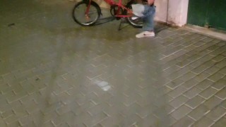Sexy guy undresses on a public street and rides a bike naked touching his dick - risky