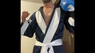 Gay jerking off with boxing gloves.