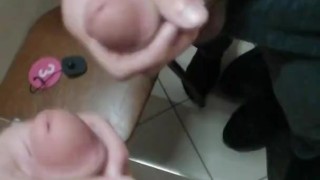 Guy fingering his big dick in the locker room close-up