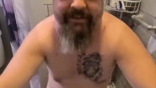 Caged slave drinks his own piss in the shower at Sir's request