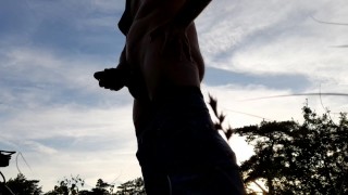 hot guy with perfect cock masturbates in beautiful public sundown scenery