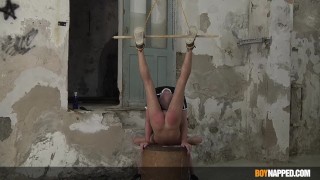 Restrained twink Jakwy Combe spanked by daddy Sebastian Kane