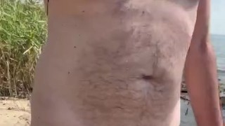 Hairy Dad Bod Bouncing Along the Nude Beach