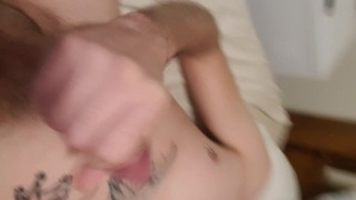 Bearded tattooed guy wanking