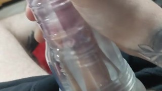 Tattooed guy cums with fleshlight