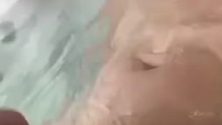 Blowing loads in the hot tub during a storm