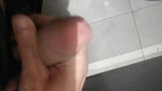 Jerked off his big dick in a public place before departure