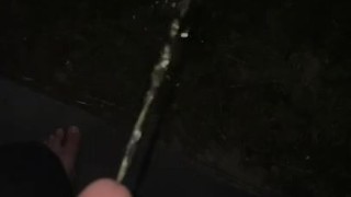 Slow Motion Outdoors Pissing in Backyard