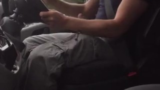 Muscular trucker jerks off and cums while driving