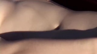 Petite teen masturbates outdoors