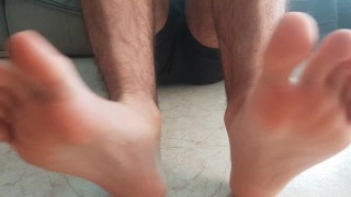 Hot guy massaging his feet. Foot fetish