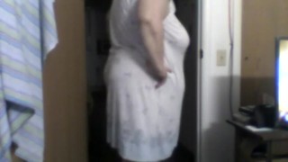 a big woman in nightgown