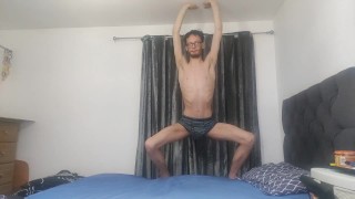 Very very skinny teen stretches out his bones and muscles on his bed