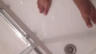 My male feet in the shower