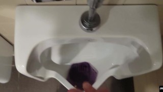 johnholmesjunior does a quick jerk off in open urinal movie theater bathroom