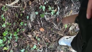 This dude pulls his cock out and takes a piss