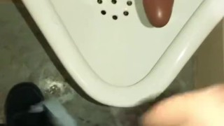 Pissing at a urinal first thing in the morning with my friend dildo 