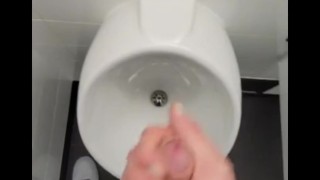 SLOW MOTION johnholmesjunior shooting cum load in busy mens bathroom in slow motion