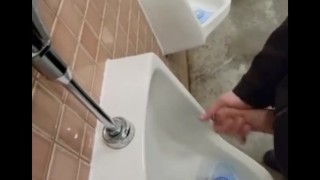 SLOW MOTION johnholmesjunior shoots cum load in busy vancouver park bathroom slow motion