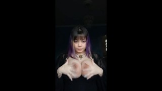 Goth girl with long nails wearing sheer lingerie plays with big tits