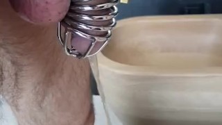 I love to show myself with the cage while I piss