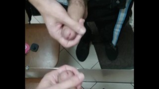 having fun with a big dick in a fitting booth in a store