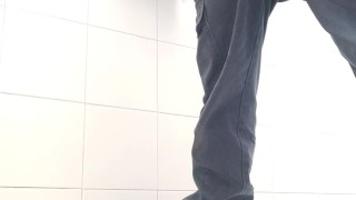 I piss in the public toilet, and I do a half wank