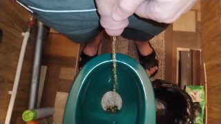 PISSING IN TOILET and then squeezed the rest of the urine out of the big dick
