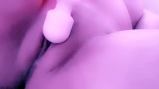Pregnant milf toying with her pussy