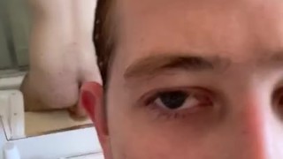 Twink rides dildo on bathroom sink