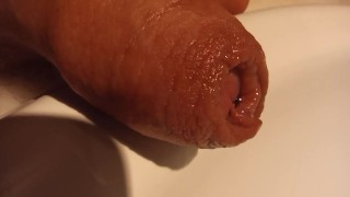 Close up pee. Uncut foreskin 