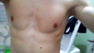 hot man flexing his muscles