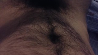Hairy man is masturbating