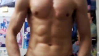 SEXY MAN SHOWING BEAUTIFUL MUSCLES