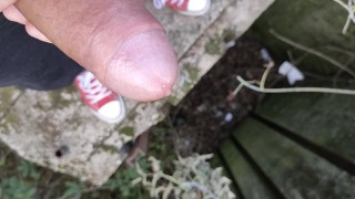 Uncut cock cumshot from a bridge close up