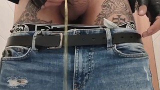 Femboy pissing and jerking off in a public toilet
