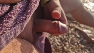 JERKING OFF on the way to the beach with CUMSHOT after naked swimming